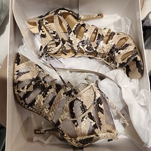 BRAND NEW never worn.  Strappy heels size 6.